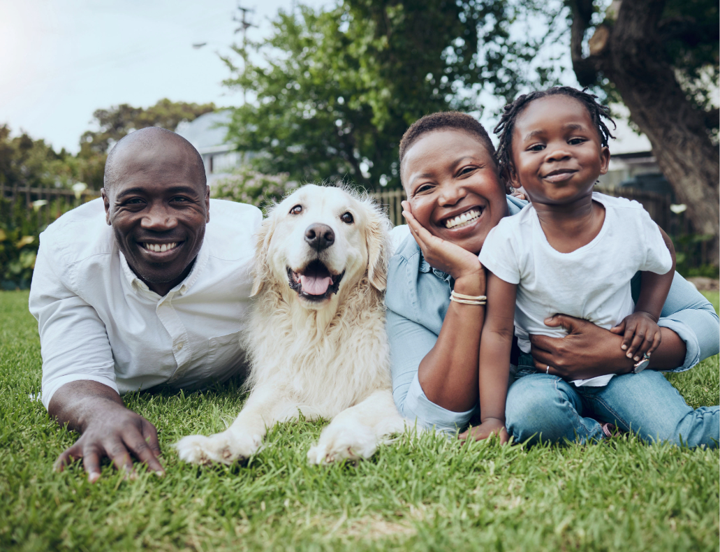 Family outside with dog
