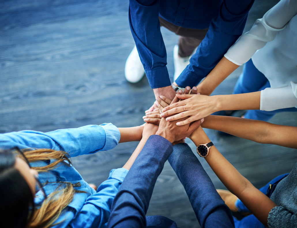 Business team all hands in